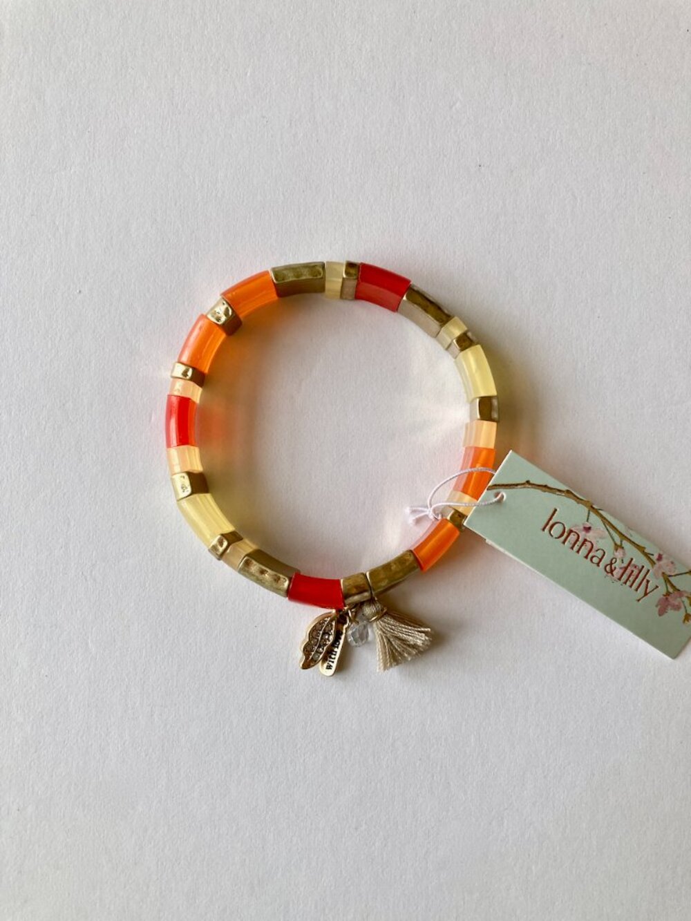 NWT Lonna & Lilly Chiclet Stretch Bracelet 1/2" Orange Gold Cream Dangle Charms